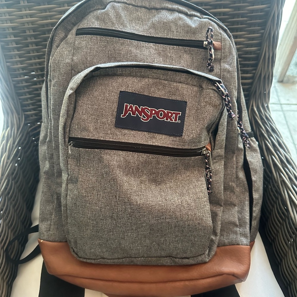 Grey Jansport backpack. Only used a few times. Good as new.